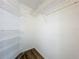 Spacious walk-in closet with custom shelving for optimal organization and storage at 3960 Villas Green Cir, Longwood, FL 32779