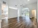 Spacious living room with wood floors and an open layout for flexible living at 3960 Villas Green Cir, Longwood, FL 32779