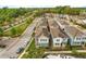 An aerial view of a neighborhood with sidewalks, manicured lawns and various colored two-story homes at 4622 Eureka Ln, Sanford, FL 32773