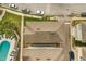 Bird's-eye view of multi-story townhomes with a community pool, greenery, and convenient parking at 4622 Eureka Ln, Sanford, FL 32773