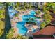 Aerial view of community's resort-style pool, lazy river, and splash pad at 7675 Comrow St # 204, Kissimmee, FL 34747