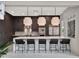 Modern kitchen featuring dark cabinetry, waterfall island with bar seating, and stainless steel appliances at 8521 Lake Nona Shore Dr, Orlando, FL 32827