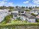 A modern home with a pool, putting green, and an expansive outdoor seating area perfect for entertaining guests at 8521 Lake Nona Shore Dr, Orlando, FL 32827