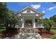 A picturesque gazebo with columns and a white roof, perfect for outdoor relaxation and gatherings at 876 Kensington Gardens Ct, Oviedo, FL 32765