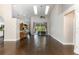 Living room with hardwood floors, skylight and sliding glass door to back patio at 876 Kensington Gardens Ct, Oviedo, FL 32765