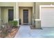 Inviting front door and well maintained walkway for this home at 965 Lido Dr, Howey In The Hills, FL 34737