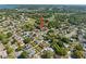 Aerial view of home and neighborhood showing mature trees and landscaping at 1019 Spring Landing Dr, Winter Garden, FL 34787