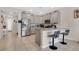 Modern kitchen with stainless steel appliances, granite countertops, and stylish breakfast bar at 11038 Leafshore Loop, Orlando, FL 32829