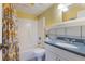 Cozy bathroom featuring a shower-tub combo and a stylish vanity at 115 Shepherd Trl, Longwood, FL 32750