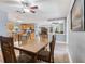 Dining room adjacent to a kitchen and living room, promoting an open and airy layout at 115 Shepherd Trl, Longwood, FL 32750