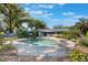 In-ground pool features brick pavers and natural landscaping at 115 Shepherd Trl, Longwood, FL 32750