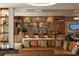 This attractive lobby bar offers an elegant brown leather sofa and attractive lighting at 14501 Grove Resort Ave # 1229, Winter Garden, FL 34787