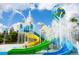 Colorful splash pad with slides and water features for , offering a fun and refreshing experience for families at 14501 Grove Resort Ave # 1229, Winter Garden, FL 34787
