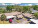 Aerial view of the home, showing the covered parking and the well maintained landscaping and community layout at 1912 Abbington St # Ge, Apopka, FL 32712