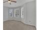 Neutral bedroom with carpeted floor, ceiling fan and ample windows for natural light at 1923 Osman Ave, Orlando, FL 32806