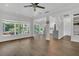 Spacious living room featuring hardwood floors and views of the lanai at 1923 Osman Ave, Orlando, FL 32806