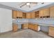 Well-lit office with ceiling fan, tiled floors, granite counters, and lots of storage space at 1923 Osman Ave, Orlando, FL 32806