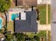 Aerial view of the house showing pool, patio, backyard, and landscaping at 1925 Poinsetta Ln, Maitland, FL 32751