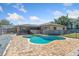 Exterior view of private backyard pool and patio with -safe fence at 1925 Poinsetta Ln, Maitland, FL 32751