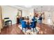 Charming dining room with hardwood floors adjacent to the modern kitchen at 1984 Windermere Rd, Windermere, FL 34786