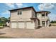 A beautiful home with a three-car garage and brick driveway at 1984 Windermere Rd, Windermere, FL 34786