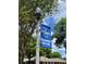 Street view showing Windermere Centennial banner on decorative lamp post among tree branches at 1984 Windermere Rd, Windermere, FL 34786