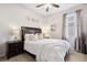 Bedroom featuring a ceiling fan and window at 2315 Cypress Trace Cir, Orlando, FL 32825