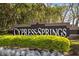 Attractive Cypress Springs community sign surrounded by lush landscaping at 2315 Cypress Trace Cir, Orlando, FL 32825