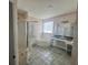 Bathroom featuring a separate shower and tub, a window, and a vanity at 2625 Queen Mary Pl, Maitland, FL 32751