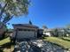 Well-kept single story home with a two-car garage and landscaping at 2625 Queen Mary Pl, Maitland, FL 32751