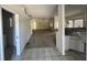 Open-concept living room flowing seamlessly into kitchen area at 2625 Queen Mary Pl, Maitland, FL 32751