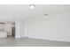 Open living room featuring modern tile floors at 312 Castle Dr, Lake Alfred, FL 33850