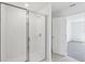 Bright bathroom features a shower with sliding glass doors at 312 Castle Dr, Lake Alfred, FL 33850