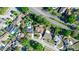 Aerial view of the neighborhood showcasing nearby roads, landscaping, and neighborhood pools at 320 Dublin Dr, Lake Mary, FL 32746