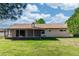 Expansive backyard and covered patio of the property, perfect for outdoor enjoyment at 320 Dublin Dr, Lake Mary, FL 32746