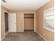 Bedroom featuring carpet flooring, a window, and closet space at 320 Dublin Dr, Lake Mary, FL 32746