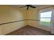 Bedroom with a window and carpeted flooring at 3734 Hampton Hills Dr, Lakeland, FL 33810