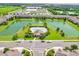 Aerial view of community pool, clubhouse and lake at 432 Treasure Ln, Sanford, FL 32771