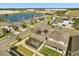 Aerial view of homes, lake and surrounding neighborhood at 432 Treasure Ln, Sanford, FL 32771