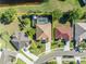 Aerial view of property showcasing pool, fenced yard, and surrounding neighborhood at 4907 Culdesac Ct, St Cloud, FL 34772