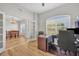 Bright and functional home office space with French doors opening into dining area at 4907 Culdesac Ct, St Cloud, FL 34772