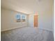 Bedroom filled with natural light, featuring large windows and access to a walk-in closet at 5074 Sparkling Water Way, Kissimmee, FL 34746