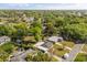 Aerial view of the neighborhood showing residential homes and a lush tree canopy at 520 Oriole Dr, Lakeland, FL 33803