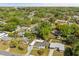 Aerial view of the neighborhood featuring tree-lined streets and well-maintained homes at 520 Oriole Dr, Lakeland, FL 33803