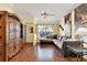 Cozy living room featuring hardwood floors, a sofa, and natural light at 5429 Lake Margaret Dr # 185, Orlando, FL 32812