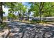 Quiet community street lined with well-maintained apartments and mature trees at 5429 Lake Margaret Dr # 185, Orlando, FL 32812