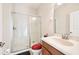 Bright bathroom featuring a glass shower, vanity with sink, and neutral color palette at 5832 Tarleton Way, Mount Dora, FL 32757