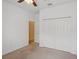 Bedroom with closet and view to hallway at 5832 Tarleton Way, Mount Dora, FL 32757