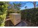 Standby generator for uninterrupted power, surrounded by lush landscaping for aesthetic appeal at 7841 Georgeann St, Winter Park, FL 32792