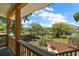 View of a lush backyard featuring a fire pit, ample greenery, and a beautifully landscaped garden at 809 Poinsettia Dr, Eustis, FL 32726